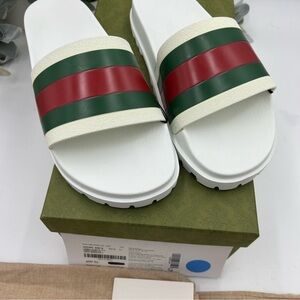 Men’s Gucci web slide sandals size 12 made in Italy.